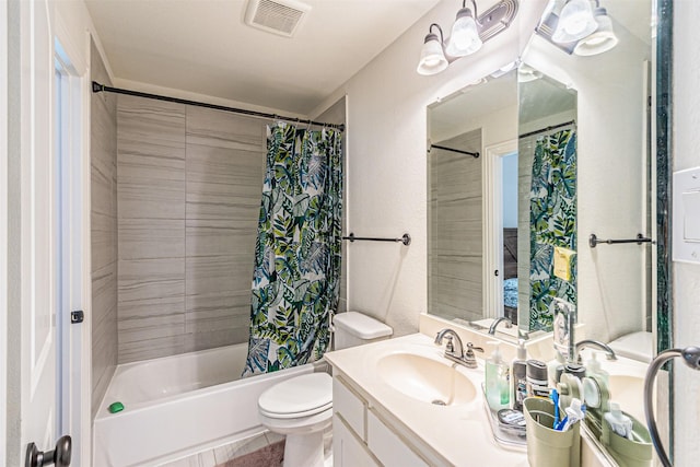 full bath featuring visible vents, toilet, vanity, shower / bath combination with curtain, and a textured wall