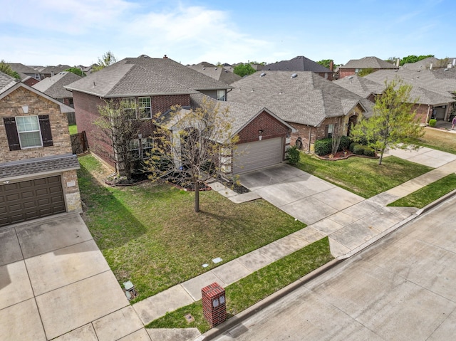 2416 Grand Rapids Dr, Fort Worth, TX 76177 - view of front of home with driveway, brick siding, and a residential view