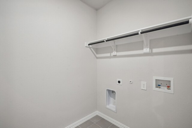 laundry room featuring hookup for an electric dryer, hookup for a washing machine, baseboards, laundry area, and hookup for a gas dryer