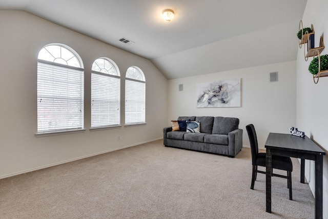 10617 Cochron Dr, Mckinney, TX 75072 - living area featuring carpet flooring, vaulted ceiling, a healthy amount of sunlight, and visible vents
