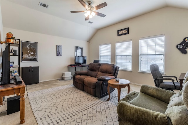living room featuring visible vents, baseboards, a ceiling fan, light carpet, and lofted ceiling