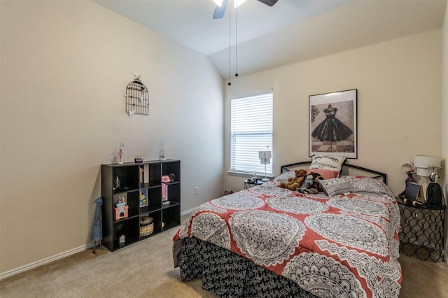 carpeted bedroom with baseboards, a ceiling fan, and lofted ceiling