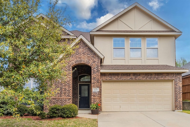 1129 Hidden Lake Dr, Burleson, TX 76028 - view of front of house with brick siding, a shingled roof, and a garage