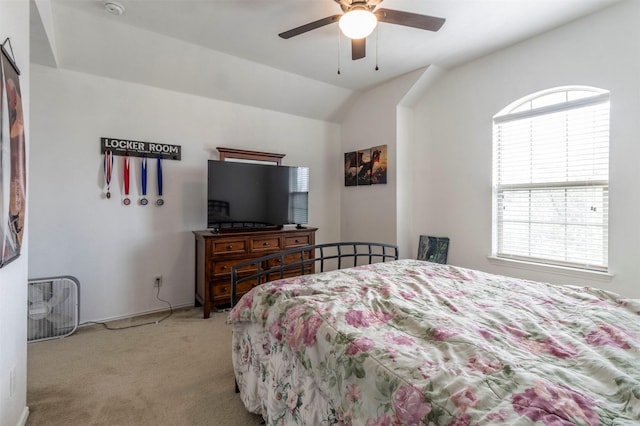 bedroom with light carpet, a ceiling fan, and lofted ceiling