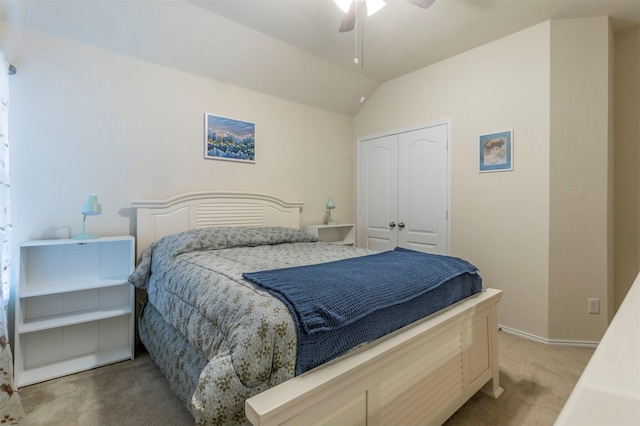 bedroom with a closet, baseboards, a ceiling fan, light carpet, and lofted ceiling