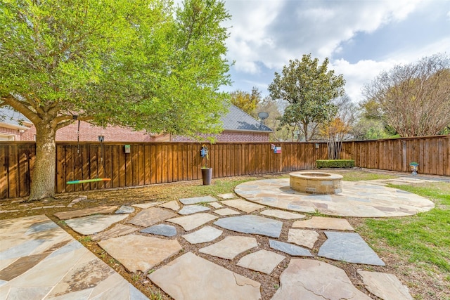 5 Pamela Ct, Mansfield, TX 76063 - view of yard featuring a fenced backyard, a fire pit, and a patio