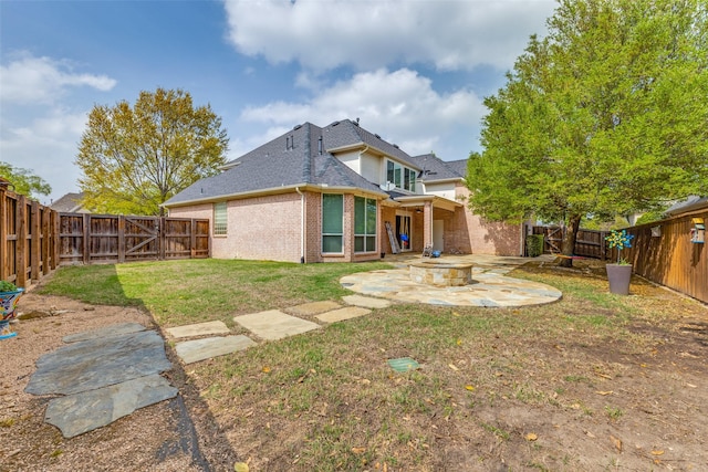 5 Pamela Ct, Mansfield, TX 76063 - rear view of property featuring a patio, a fenced backyard, brick siding, a lawn, and a shingled roof