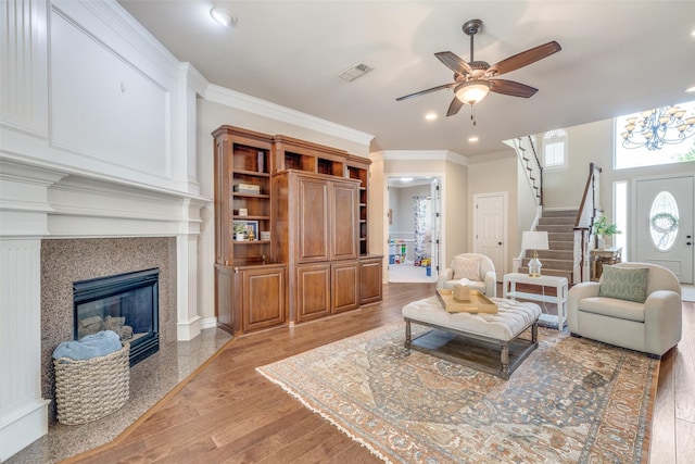 5 Pamela Ct, Mansfield, TX 76063 - living area with light wood-type flooring, a ceiling fan, stairway, and visible vents