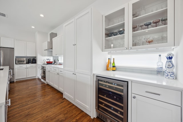 4980 Fuqua St, Dallas, TX 75206 - kitchen with white cabinetry, wall chimney exhaust hood, glass insert cabinets, beverage cooler, and dark wood-style flooring