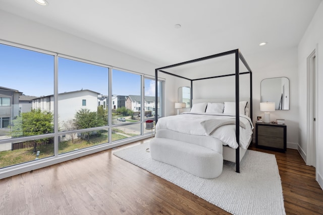 4980 Fuqua St, Dallas, TX 75206 - bedroom with a residential view, recessed lighting, baseboards, and wood finished floors