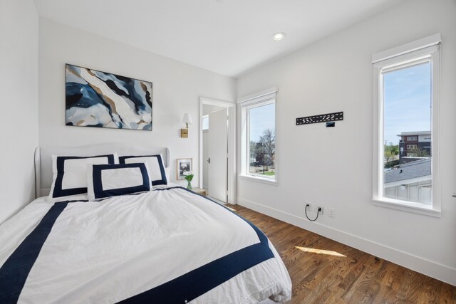 4980 Fuqua St, Dallas, TX 75206 - bedroom featuring baseboards, recessed lighting, wood finished floors, and multiple windows