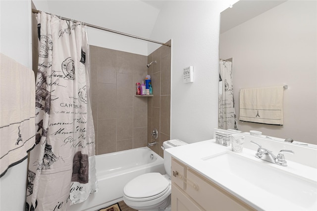 bathroom with vanity, toilet, and shower / tub combo