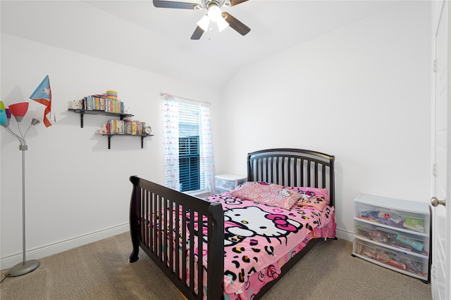 carpeted bedroom featuring a ceiling fan, baseboards, and vaulted ceiling