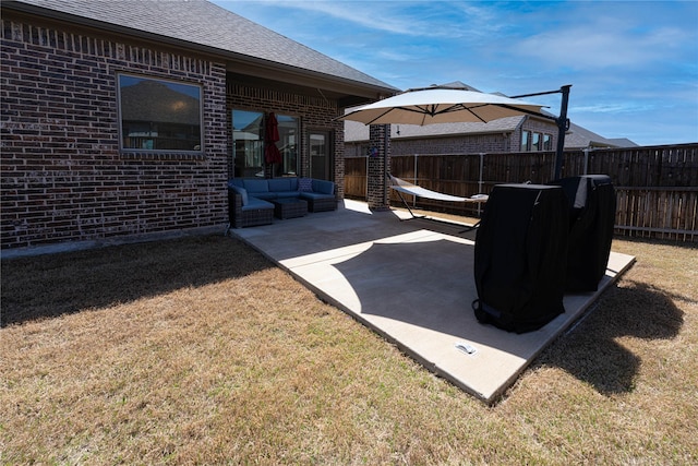 view of patio / terrace featuring an outdoor hangout area and fence