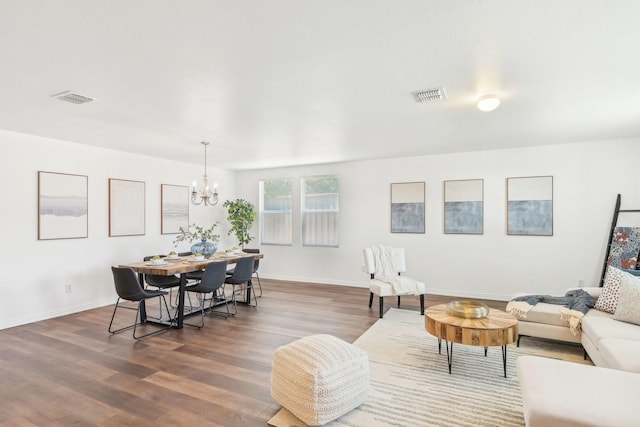 2905 Meadow Bluff Dr, Wylie, TX 75098 - living area featuring a chandelier, dark wood finished floors, and baseboards