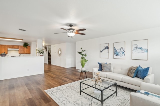 2905 Meadow Bluff Dr, Wylie, TX 75098 - living area featuring wood finished floors and ceiling fan