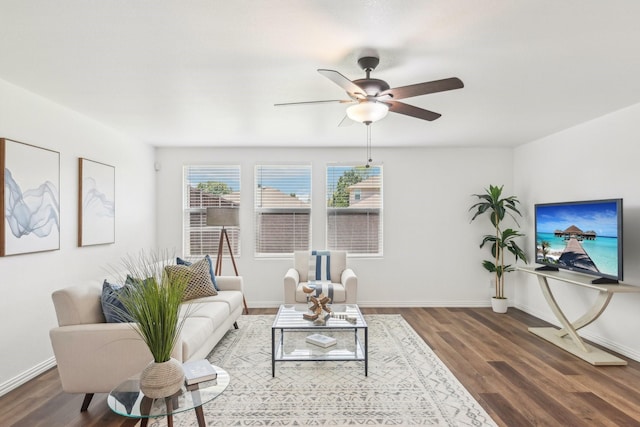 2905 Meadow Bluff Dr, Wylie, TX 75098 - living area featuring wood finished floors, a ceiling fan, and baseboards