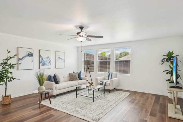 2905 Meadow Bluff Dr, Wylie, TX 75098 - living room featuring a ceiling fan, baseboards, and dark wood-type flooring