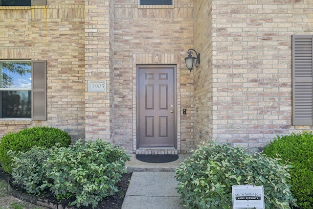 2905 Meadow Bluff Dr, Wylie, TX 75098 - doorway to property with brick siding
