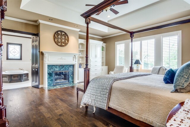 5816 Forest Highlands Dr, Fort Worth, TX 76132 - bedroom with a high end fireplace, crown molding, wood finished floors, recessed lighting, and a raised ceiling