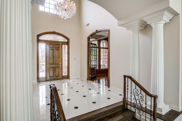 5816 Forest Highlands Dr, Fort Worth, TX 76132 - entryway featuring a wealth of natural light, visible vents, a high ceiling, and ornate columns
