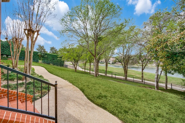 5816 Forest Highlands Dr, Fort Worth, TX 76132 - surrounding community with a lawn and a water view