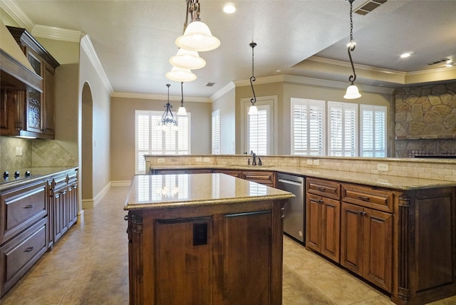 1304 Rollie Michael Ln, Fort Worth, TX 76179 - kitchen featuring a sink, a kitchen island, dishwasher, arched walkways, and backsplash
