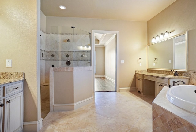1304 Rollie Michael Ln, Fort Worth, TX 76179 - full bath featuring a garden tub, tile patterned flooring, vanity, baseboards, and walk in shower