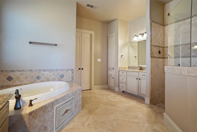 1304 Rollie Michael Ln, Fort Worth, TX 76179 - full bath featuring walk in shower, visible vents, a bath, and vanity
