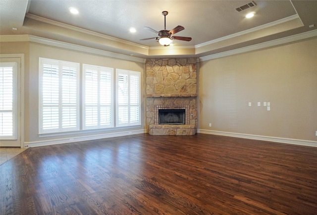 1304 Rollie Michael Ln, Fort Worth, TX 76179 - unfurnished living room with ceiling fan, visible vents, wood finished floors, and a tray ceiling