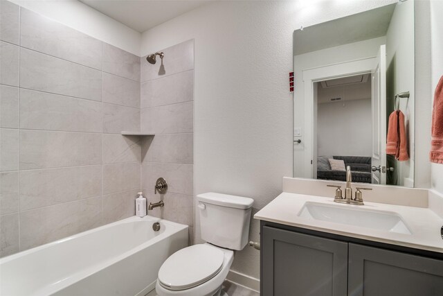 6510 Baritone Ct, Sachse, TX 75048 - bathroom featuring vanity, toilet, shower / bathtub combination, and ensuite bathroom
