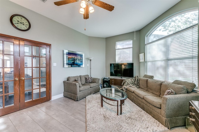 209 Timberbluff Ln, Murphy, TX 75094 - living room featuring french doors, baseboards, ceiling fan, and light tile patterned floors