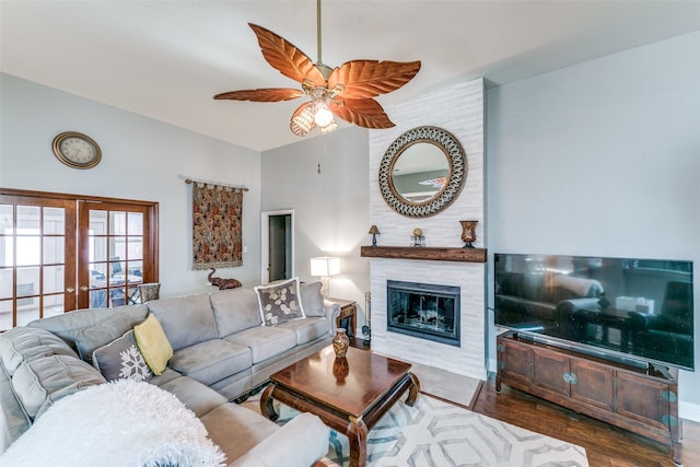 209 Timberbluff Ln, Murphy, TX 75094 - living room with french doors, a fireplace, a ceiling fan, and wood finished floors