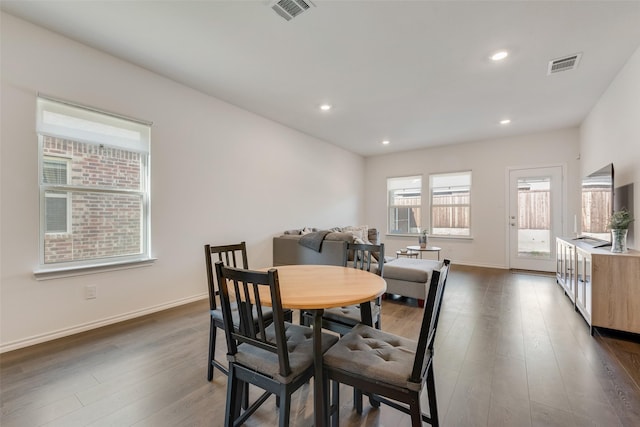 3213 Grimaldo Dr, Mesquite, TX 75126 - dining room with wood finished floors, baseboards, and recessed lighting