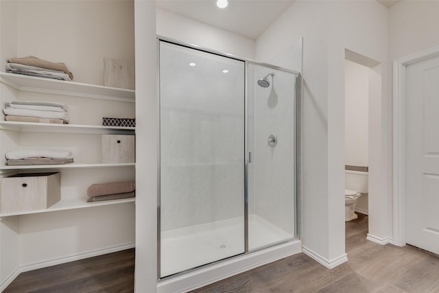 3213 Grimaldo Dr, Mesquite, TX 75126 - full bath featuring wood finished floors, a stall shower, toilet, baseboards, and recessed lighting