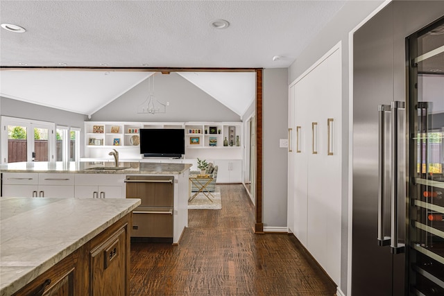 5230 Boca Raton Dr, Dallas, TX 75229 - kitchen with a textured ceiling, a sink, vaulted ceiling, and high end fridge