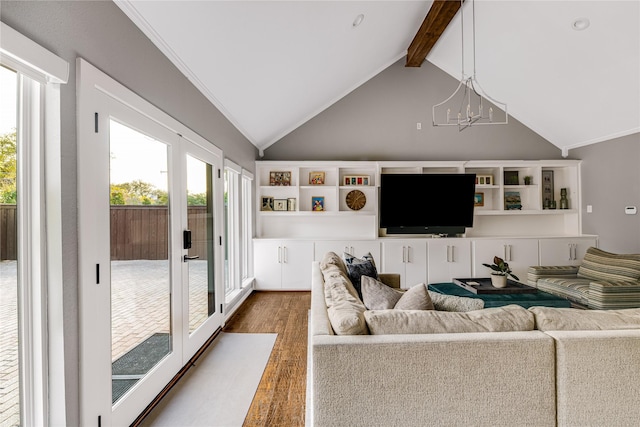 5230 Boca Raton Dr, Dallas, TX 75229 - living room with vaulted ceiling with beams, wood finished floors, french doors, and an inviting chandelier