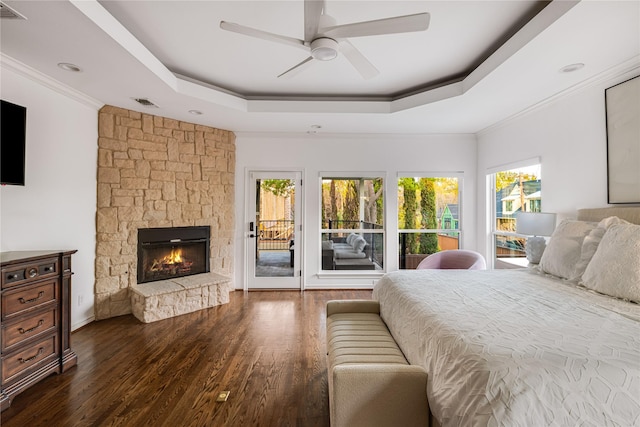 5230 Boca Raton Dr, Dallas, TX 75229 - bedroom featuring a tray ceiling, crown molding, wood finished floors, and access to outside