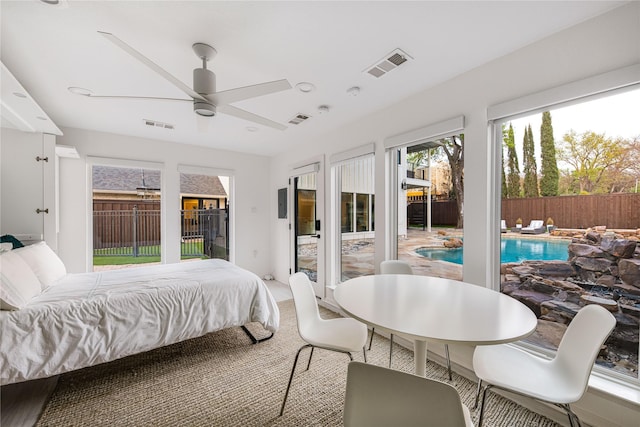 5230 Boca Raton Dr, Dallas, TX 75229 - carpeted bedroom featuring a ceiling fan, access to exterior, and visible vents