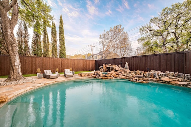 5230 Boca Raton Dr, Dallas, TX 75229 - view of pool featuring a patio, a fenced in pool, and a fenced backyard