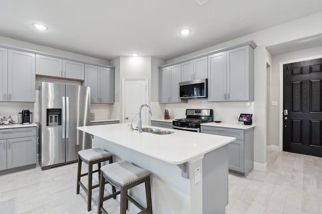 1702 Gallant Fox Dr, Rockwall, TX 75032 - kitchen with stainless steel appliances, gray cabinets, and recessed lighting