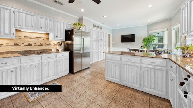5835 Mapleshade Ln, Dallas, TX 75252 - kitchen featuring high end refrigerator, white cabinets, decorative backsplash, a ceiling fan, and light tile patterned floors