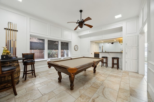 5835 Mapleshade Ln, Dallas, TX 75252 - playroom with a decorative wall, ceiling fan, billiards table, and bar