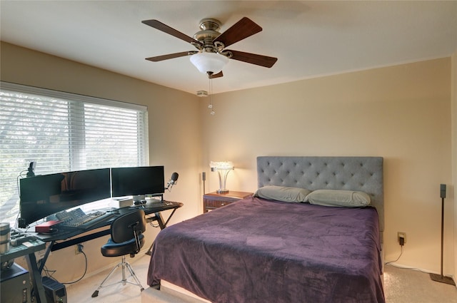 bedroom featuring carpet and a ceiling fan