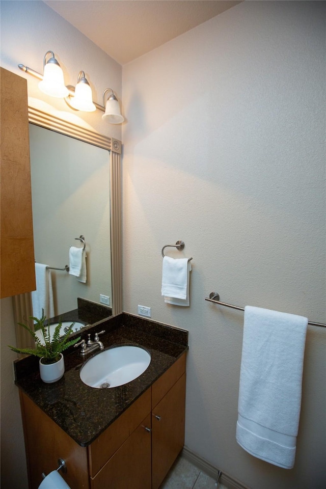 bathroom featuring vanity and tile patterned flooring