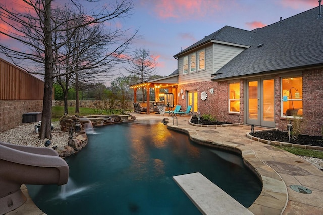 820 Clearlake Dr, Prosper, TX 75078 - view of pool with french doors, a patio, fence, a diving board, and central AC