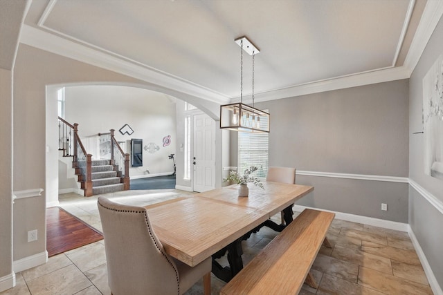 820 Clearlake Dr, Prosper, TX 75078 - dining room featuring arched walkways, stairs, a chandelier, ornamental molding, and baseboards