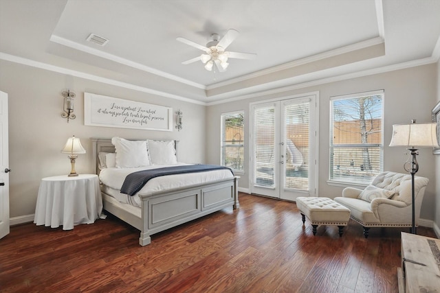 820 Clearlake Dr, Prosper, TX 75078 - bedroom featuring a raised ceiling, access to exterior, dark wood-type flooring, ornamental molding, and french doors