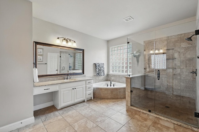 820 Clearlake Dr, Prosper, TX 75078 - bathroom featuring a garden tub, vanity, a stall shower, and tile patterned floors