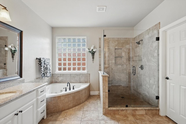 820 Clearlake Dr, Prosper, TX 75078 - bathroom featuring a stall shower, a whirlpool tub, vanity, and tile patterned floors